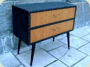 Swedish 50's small
chest of drawers dressed in black vinyl