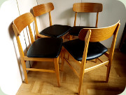 Stolar teak och ek med
klädsel i svart konstläder 60-tal