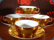 Royal Worcester Gold
                          Lustre cream soup bowls and saucers