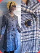 Rutig kappa i blåtoner glencheck från Tebewe Modeller & Marguerite Woollens