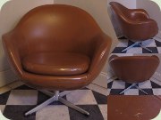 Swedish 60's brown
                          vinyl swivel base lounge chair