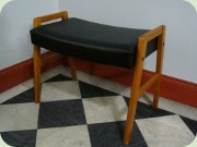 Swedish 60's teak
                          stained beech stool upholstered in black
                          vinyl