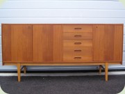 Swedish 60's teak
                          veneer sideboard with 5 drawers