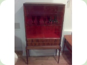 Swedish design rosewood cabinet with
                          drawes and sliding glass doors, red on the
                          inside. Svante Skogh, Seffle Möbelfabrik.