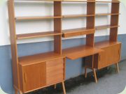 Swedish 50's teak book
                          shelf, cabinets with sliding doors