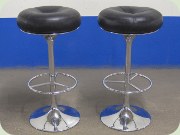 Chrome & black
                          leather bar stools by Johansson Design,
                          Sweden