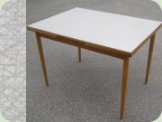 Extending dining table
                          by Edsbyverken, Perstorp laminated top in the
                          well known pattern Virrvarr by Sigvard
                          Bernadotte