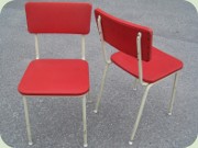 Swedish 50's kitchen
                          chairs in white lacquered steel and red vinyl