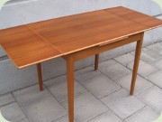 50's small teak & oak dining table
                          with Dutch leaves