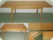 Rektangulärt matbord i
                          ljus ek med två iläggsskivor 60-tal eller
                          70-tal