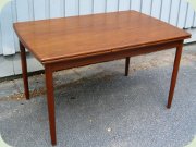 Scandinavian 50's teak
                          dining table with dutch leaves