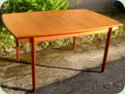 Scandinavian 60's teak
                          dining table with 2 extension leaves