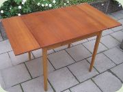 Swedish 60's teak
                          dining table with extension leaves