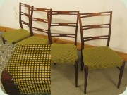 Mahogany coloured
                          dining chairs with greenish yellow upholstery