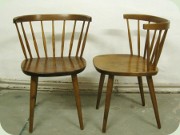 A pair of Swedish 50's
                          stained birch side chairs, probably designed
                          by Yngve Ekström