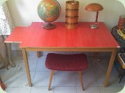 Table with red
                          Perstorp laminate top