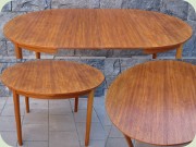 Swdish 50's or 60's teak veneered round
                          dining table with 2 leaves