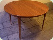 Scandinavian 50's or
                          60's teak & oak round dining table with
                          leaves