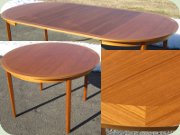 Swedish 60's round
                          teak dining table with leaves
