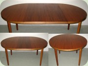 Swedish 60's round
                          walnut dining table with leaves
