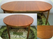 Swedish 60's round
                          walnut dining table with folding extension
                          leaves