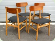 Fyra stolar i teak
                          & bok med vinylklädd sits, 60-tal