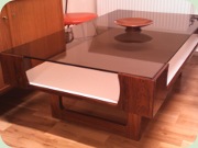 Norwegian designed
                          rosewood coffee table with glass top and white
                          inside, Torbjörn Afdal, Bruksbo