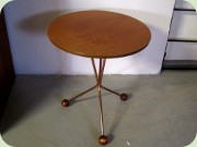 Swedish 50's round
                          teak side table on copper legs, Alberts Tibro