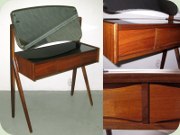 Danish 60's teak
                          dressing table with scissor legs, swivel
                          mirror, 3 drawers and black glass top