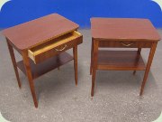 A pair of 50's
                          mahogany bedside tables with drawer
