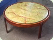 Late 60's low, round
                          coffee table, rosewood frame & three legs,
                          faux marble table top