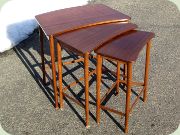 Swedish 50's mahogany
                          nesting table manufactured by Ferdinand
                          Lundquist