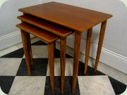 50's or 60's teak nest
                          of tables with tapered legs