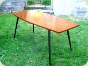 Swedish 50's mahogany
                          coffee table with black lacquered metal legs