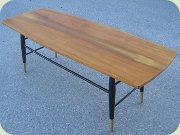 50's or 60's coffee
                          table with black lacquered legs