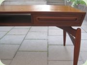 Late 50's or early
                          60's Swedish teak coffee table with magazine
                          shelf and drawers, possibly Trensum