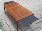 60's rosewood coffee
                          table with black laminated extension leaves