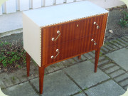 Swedish 50's or 60's
                          mahogany and light grey vinyl chest of
                          drawers