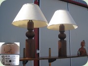 A pair of large
                          rosewood stained 70's table lamps made by
                          Luxus, Sweden