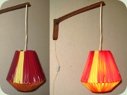 50's or 60's teak wall
                          light with plastic ribbon shade