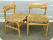 A pair of oak side
                          chairs with rope seat, Danish design by Börge
                          Mogensen for C.M. Madsens Fabriker 1958