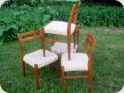 Set of four 60's teak
                          or teak stained beech dining chairs made in
                          DDR East Germany