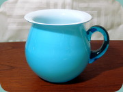 Swedish turquoise
                          cased glass vase by Bergdala Glasbruk