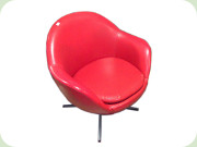 Lounge chair on swivel
                          base, red vinyl